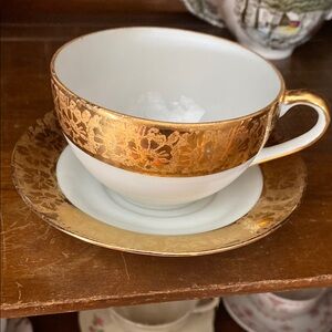 Elegant Gold and White Tea Cup and Saucer Set